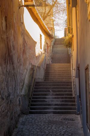 old narrow street with stairs, old town of Cesky Krumlov, Czech republicの写真素材