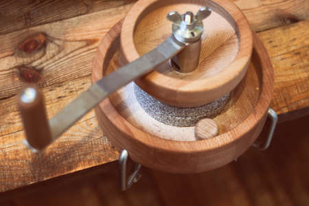 grain grinder - Manual Grain Mill for Hand Grinding, on a wooden table