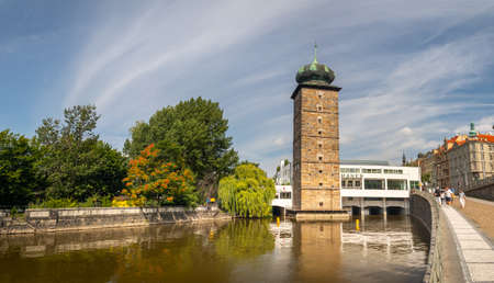 Sitkovska water tower on the bank of the Vltava River next to the Manes building, Prague, Czech republicのeditorial素材