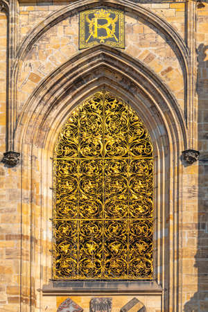 Ornate gothic window, detail of the gothic architecture of St. Vitus Cathedral, Prague, Czech...