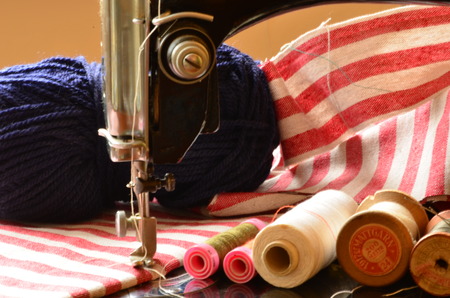 Vintage sewing machine and  thread spools