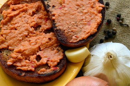Fried bread with pork spread and onion, garlic and pepper
