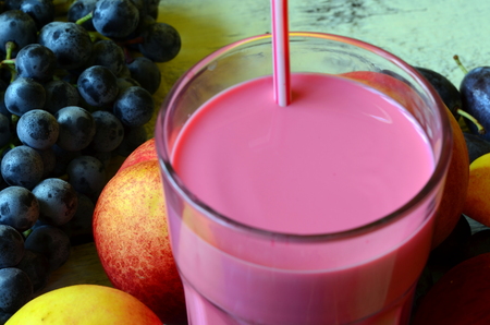 Fresh fruit smoothie on white backgroundの写真素材