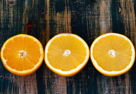 Fine art still life with oranges on wooden tableの写真素材