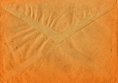 Back of an old used envelope. Rich stain and paper details. Can be used as background.