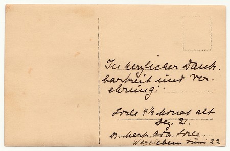 GERMANY - CIRCA 1920s: Back of a vintage photo - used postcard. Rich stain and paper details. Can be used as background. Image contains handwriting.のeditorial素材