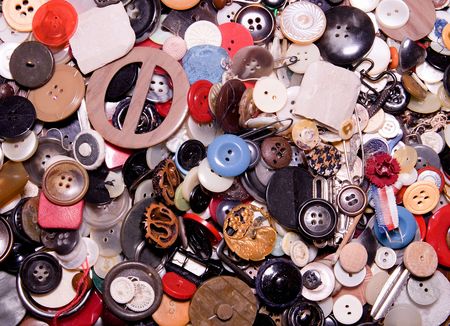 Assorted buttons. Different in color, mostly plastic, some wooden. Pile of buttons close up background.
Retro image.のeditorial素材