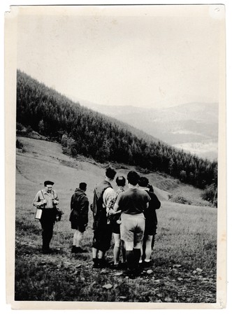 BESKYDY MOUNTAINS, THE CZECHOSLOVAK SOCIALIST REPUBLIC -  JUNE 3, 1957: Retro photo shows tourists...