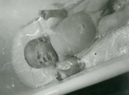 THE CZECHOSLOVAK SOCIALIST REPUBLIC - 1959:  Retro photo shows newborn baby.  Vintage black & white photography. Note: blurriness, better at smaller sizes.のeditorial素材