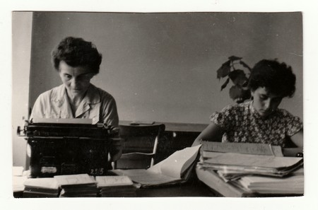 BRECLAV, THE CZECHOSLOVAK REPUBLIC, CIRCA 1955: Women in office, circa 1955.のeditorial素材