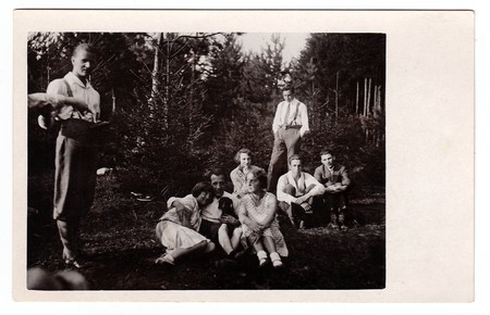 HODONIN, THE CZECHOSLOVAK REPUBLIC, CIRCA 1940: Boys with girls in nature. Vintage photo, circa 1940.のeditorial素材