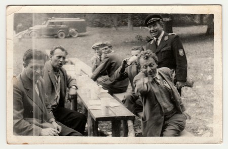 THE CZECHOSLOVAK SOCIALIST REPUBLIC, CIRCA 1965: A vintage photo shows men in the nature, circa...