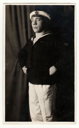 THE CZECHOSLOVAK REPUBLIC, CIRCA 1930s:  Vintage portrait photo shows young man in a marine costum....