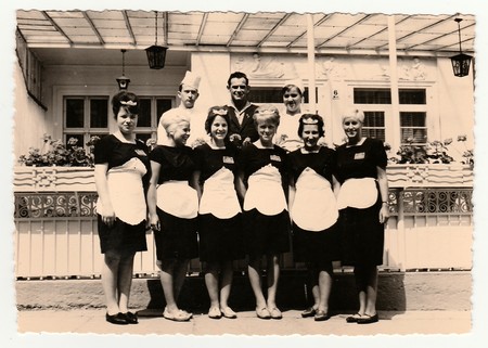 GERMANY, CIRCA 1960s: Vintage photo shows hotel staff in front of hotel, circa 1960s.のeditorial素材