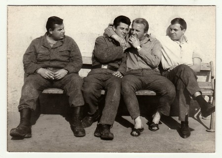 THE CZECHOSLOVAK SOCIALIST REPUBLIC, CIRCA 1965: A vintage photo shows soldiers during a rest.のeditorial素材