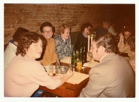 THE CZECHOSLOVAK SOCIALIST REPUBLIC, 1985: Vintage photo shows a group of people in a wine bar.のeditorial素材