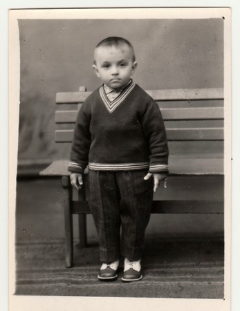 RYBINSK, RUSSIA - CIRCA 1990s: Vintage studio photo of a small boy.のeditorial素材