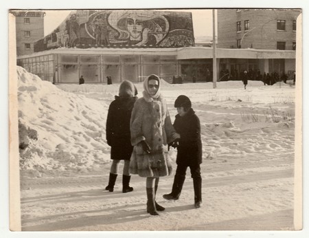 USSR - CIRCA 1980s: Vintage photo shows  girl poses on street in winter.のeditorial素材