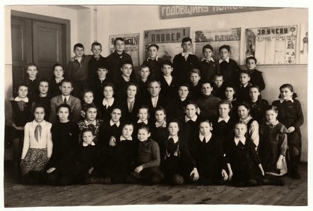 USSR - CIRCA 1950S: Vintage photo shows pupils (schoolmates) and teaching staff.のeditorial素材