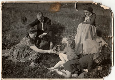 THE CZECHOSLOVAK SOCIALIST REPUBLIC - CIRCA 1960s:  Vintage photo shows family on meadow.のeditorial素材