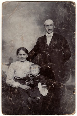 THE CZECHOSLOVAK REPUBLIC - CIRCA 1930s: Vintage photo shows family. Small boy wears child sailor costum.のeditorial素材