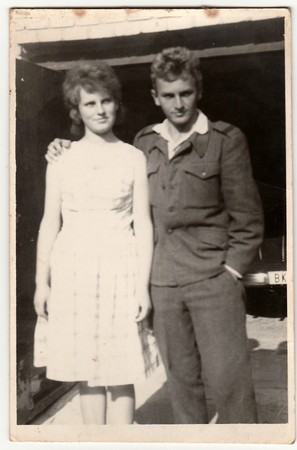 THE CZECHOSLOVAK SOCIALIST REPUBLIC - CIRCA 1950s:  An antique Black & White photo shows soldier and his girlfriend.のeditorial素材