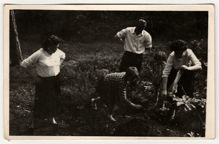 THE CZECHOSLOVAK  SOCIALIST REPUBLIC - CIRCA 1960: A vintage photo shows family outdoors.のeditorial素材