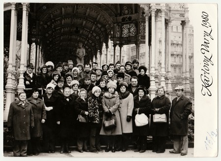 KARLOVY VARY,  THE CZECHOSLOVAK SOCIALIST REPUBLIC - FEBRUARY 15, 1980: Vintage photo shows group of people on vacation in spa resort Karlovy Vary.のeditorial素材
