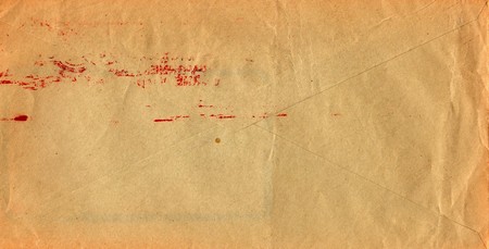 Back of an old used envelope. Rich stain and paper details. Can be used as background.の写真素材