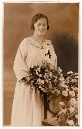 LIBEREC (REICHENBERG), THE CZECHOSLOVAK REPUBLIC - CIRCA 1940s: Vintage photo shows a bride with...