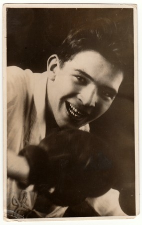MONTEVIDEO, URUGUAY - 1925: Vintage photo shows young boxer poses to a box match. Antique black & white photo.のeditorial素材