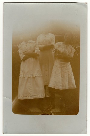 THE CZECHOSLOVAK REPUBLIC - CIRCA 1930s: Vintage photo shows girls pose outdoors. Antique black &...