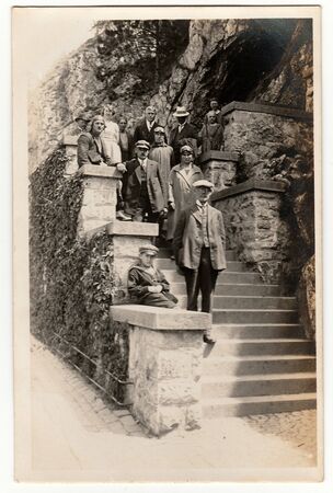 THE CZECHOSLOVAK REPUBLIC - CIRCA 1940s: Vintage photo shows people stand on the stairs outdoors....
