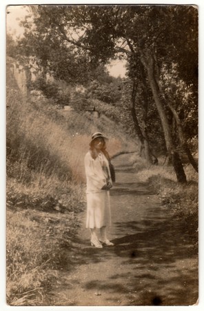 THE CZECHOSLOVAK REPUBLIC -  JUNE, 1931: Vintage photo shows young girl outdoors. Black & white antique photography.のeditorial素材