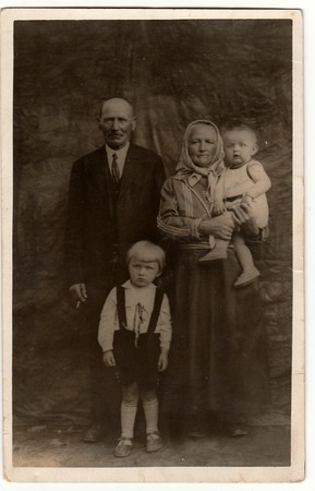 THE CZECHOSLOVAK REPUBLIC - CIRCA 1930s: Vintage photo shows a rural family. Black & white antique...