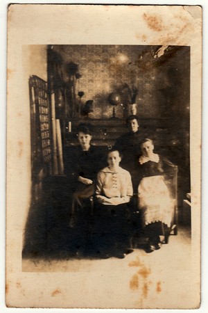 TISNOV, THE CZECHOSLOVAK REPUBLIC - CIRCA 1920s: Vintage photo shows four women in the living room....