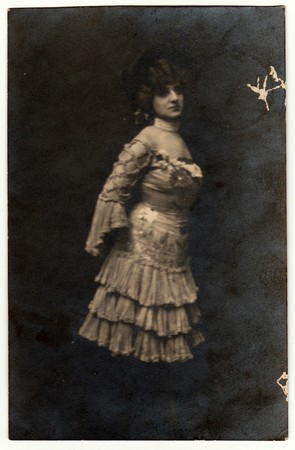 GUBEN, GERMANY - MARCH 6, 1906: Vintage photo shows woman wears a period dress with frills.のeditorial素材