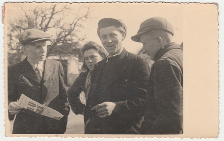 THE CZECHOSLOVAK REPUBLIC - CIRCA 1930s: Vintage photo shows boys and girl talk about news. Original...