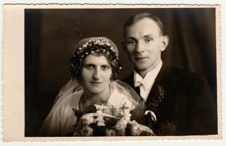 THE CZECHOSLOVAK REPUBLIC - CIRCA 1946: Vintage photo shows newlyweds. Bride wears tiara. Retro black & white photography.のeditorial素材