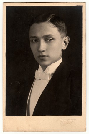 PRAHA (PRAGUE), THE CZECHOSLOVAK REPUBLIC - CIRCA 1946: Vintage photo shows portrait of a young man. Retro black & white photography.のeditorial素材