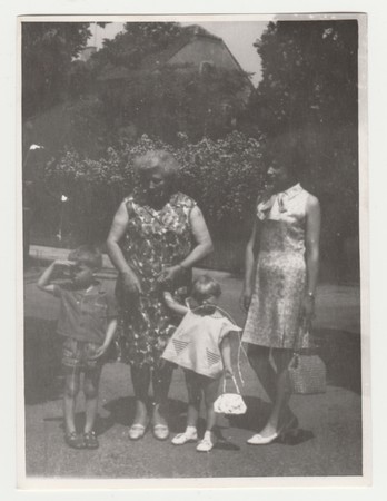 THE CZECHOSLOVAK SOCIALIST REPUBLIC - CIRCA 1970s: Vintage photo shows mother and grandmother with children outdoors. Retro black & white  photography.のeditorial素材