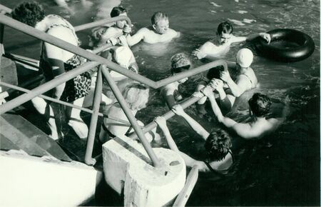 THE CZECHOSLOVAK  SOCIALIST REPUBLIC - SEPTEMBER 1965: Retro photo shows swimmers in the outdoor swimming pool. Vintage black & white photography.のeditorial素材
