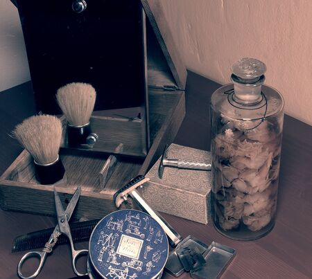 Vintage shaving accessories, perfumes and face powder. Close-up. Add postprocess effect.のeditorial素材