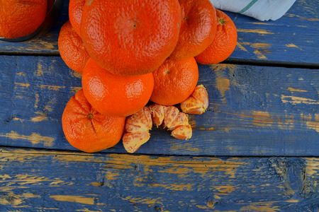 Tangerines on wooden background. Healthy and diet conceptの写真素材