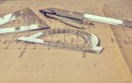 Electrical engineer workplace -  electrotechnical project, rulers,  and divider compass....
