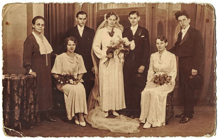 Vintage photo shows three couples of newlyweds. Retro black & white photography. 1920sのeditorial素材