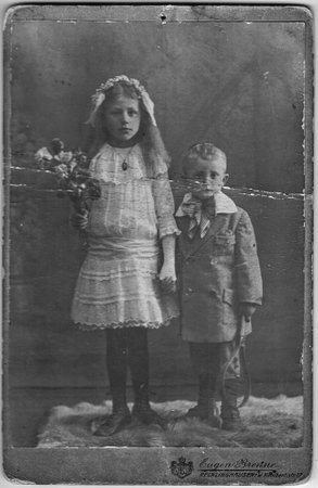 RECKLINGHAUSEN, GERMANY - CIRCA 1910s: Vintage photo shows siblings - sister and brother. About 10 and 7 years old. Studio black and white portrait.のeditorial素材