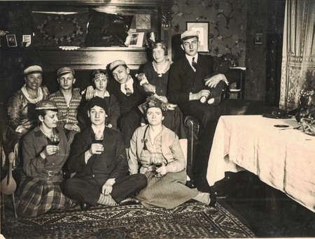 GERMANY - FEBRUARY 17, 1930: The retro photo shows a group of happy people celebrate a social event - birthday, party ... Golden the thirties before the war.のeditorial素材