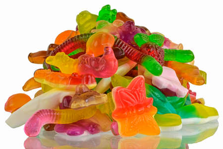 Colorful jelly gummy candies, isolated on white background. Multicolored jelly candies isolated on a white background. Jelly Bean. Mirror reflection of jelly candiesの写真素材