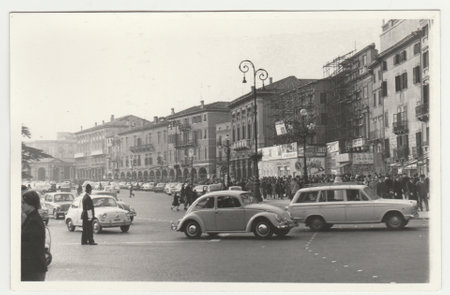 ITALY - CIRCA 1970s: Vintage photo shows the heavy traffic in Italian town. Retro black and white photography. Circa 1970s.のeditorial素材